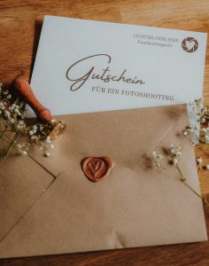 ein Gutschein für ein Fotoshooting schön dekoriert
